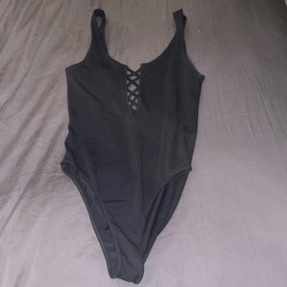 Forever 21 sleeveless black body suit, size S